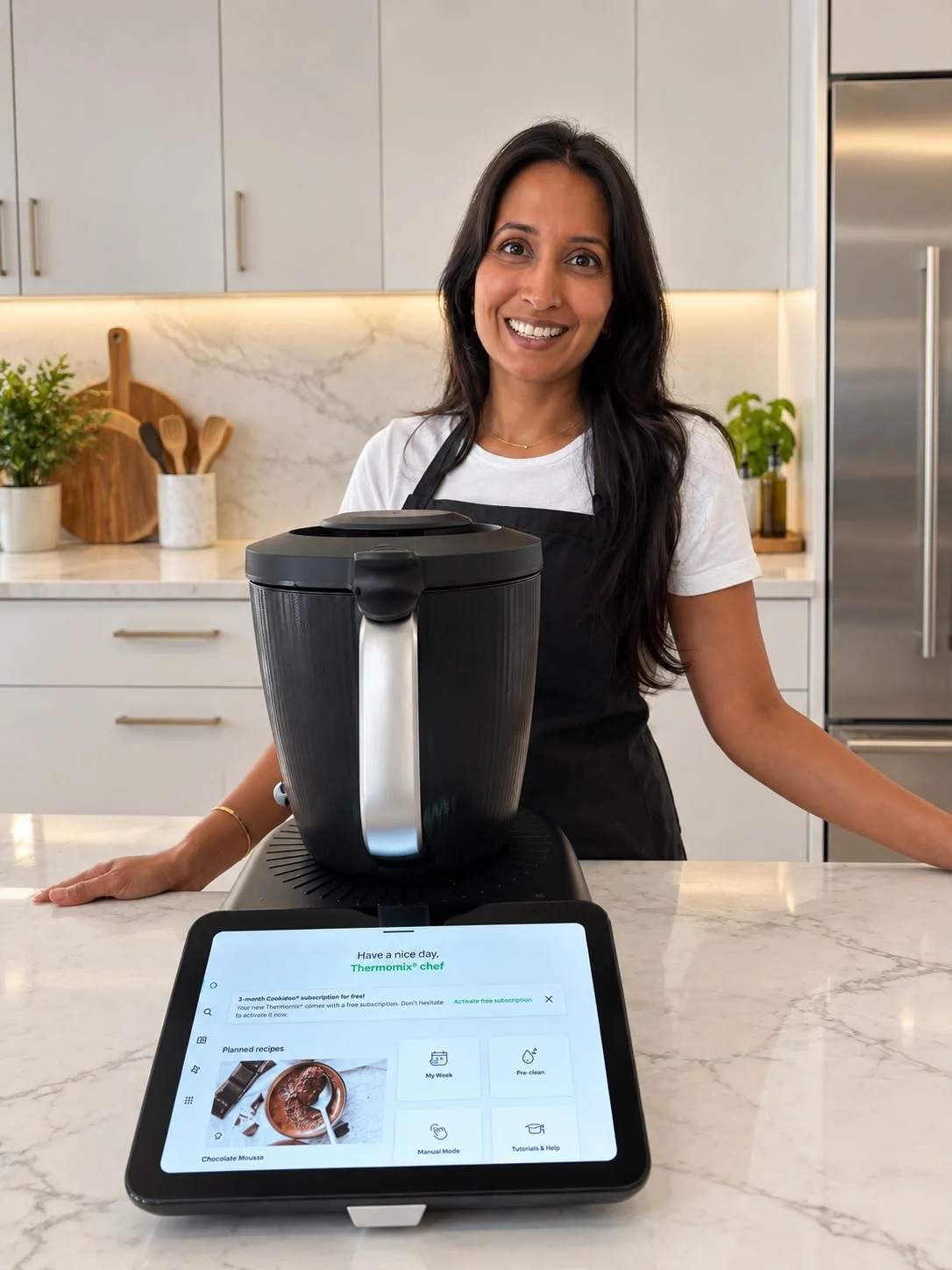 Prinal in her kitchen with her Thermomix
